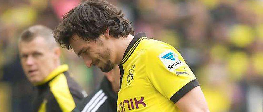 Schrecksekunde. Dortmunds Verteidiger Mats Hummels verletzte sich im Bundesliga-Spiel gegen Hoffenheim, soll bis zum Finale in der Champions League aber wieder fit sein.