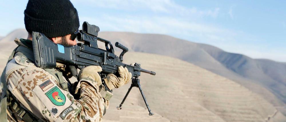 Im Visier. Bundeswehrsoldaten der Afghanistan-Schutztruppe Isaf im Dezember 2012 bei einer Übung am deutschen Außenposten OP North.