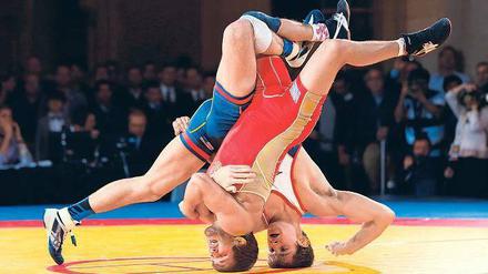 Eine Sportart wird auf den Kopf gestellt. Seit dem Warnschuss durch das IOC herrscht im Ringen hektische Betriebsamkeit.