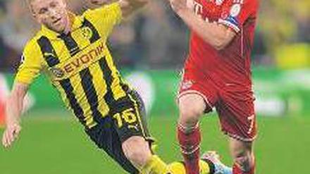 Hiergeblieben. Franck Ribéry (r.) will beim FC Bayern bis 2017 verlängern. Foto: AFP