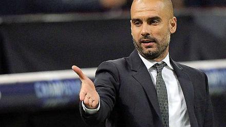Begrüßung per Handschlag: Pep Guardiola kommt bestens vorbereitet zu den Bayern - wenn er das Bayern-ABC gelesen hat.