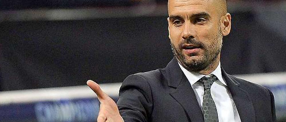 Begrüßung per Handschlag: Pep Guardiola kommt bestens vorbereitet zu den Bayern - wenn er das Bayern-ABC gelesen hat.