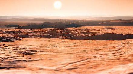 Die Animation der Forscher zeigt die Oberfläche einer der jetzt entdeckten bewohnbaren Super-Erden mit Blick in ihre Sonne, den Stern Gliese 667C.