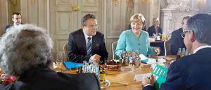 Bundeskanzlerin Angela Merkel (CDU) und Bundesinnenminister Hans-Peter Friedrich (CSU).