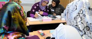 Anträge, Formulare, Tests: Wer die Strapazen auf sich nimmt, bekennt sich zu diesem Staat.