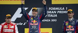 Vettel feiert, Alonso hängt in den Seilen.