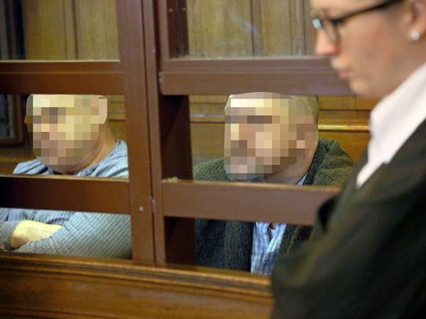 Michael W., der mutmaßlich den Schützen angeheuert haben soll, und Holger B., der dazu den Auftrag gegeben haben soll.