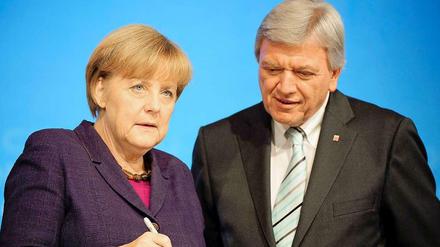 Parteichef und Ministerpräsident Volker Bouffier mit der Kanzlerin. 