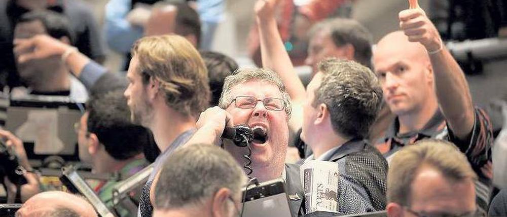 Überrascht und erleichtert. Händler an den Aktien- und Terminbörsen brachen nach der Entscheidung der US-Notenbank in Jubel aus.