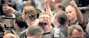 Überrascht und erleichtert. Händler an den Aktien- und Terminbörsen brachen nach der Entscheidung der US-Notenbank in Jubel aus.