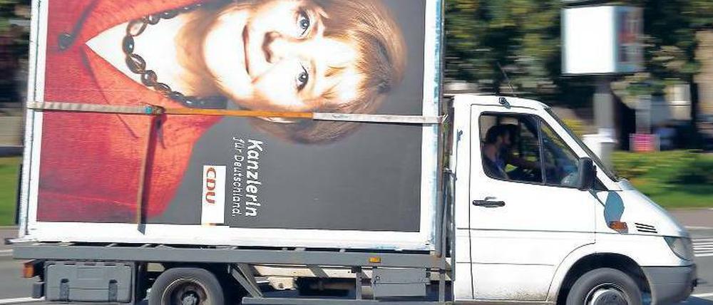 Nach der Wahl. Merkels Sieg wird von der Wirschaft begrüßt – gewarnt wird nun vor einer Hängepartie bei der Regierungsbildung. 