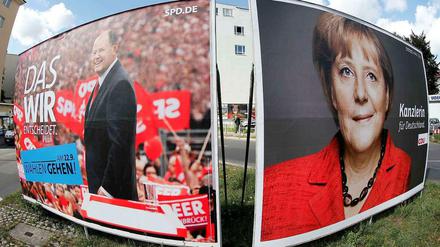 Der Herausforderer und die Kanzlerin.