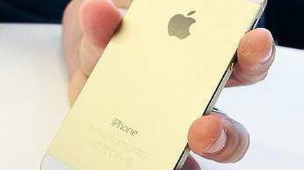 Selten und begehrt. Das iPhone in seiner goldfarbenen Version. Foto: AFP