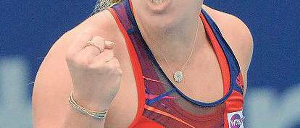 Geht doch. Angelique Kerber freut sich über ihren insgesamt dritten Titel. Foto: dpa