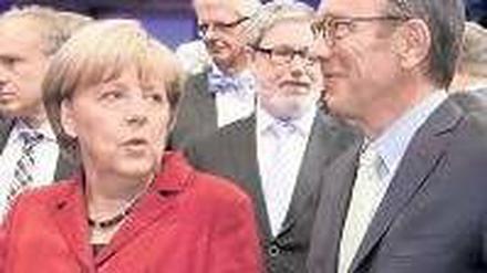 Per Du: Autokanzlerin Angela Merkel und Autopräsident Matthias Wissmann.Foto: dpa