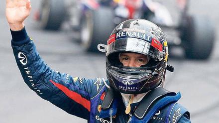 Gruß an die Hinterherfahrer. Beim Rennen in Indien ließ Vettel der Konkurrenz schon zum zehnten Mal in diesem Jahr keine Chance. Und die Chancen stehen gut, dass er auch in der kommenden Saison allen davonfährt. Foto: dpa