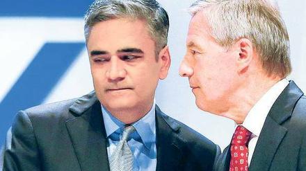 Blick zurück. Die Vergangenheit der Deutschen Bank beschäftigt die Co-Chefs Anshu Jain (l.) und Jürgen Fitschen.