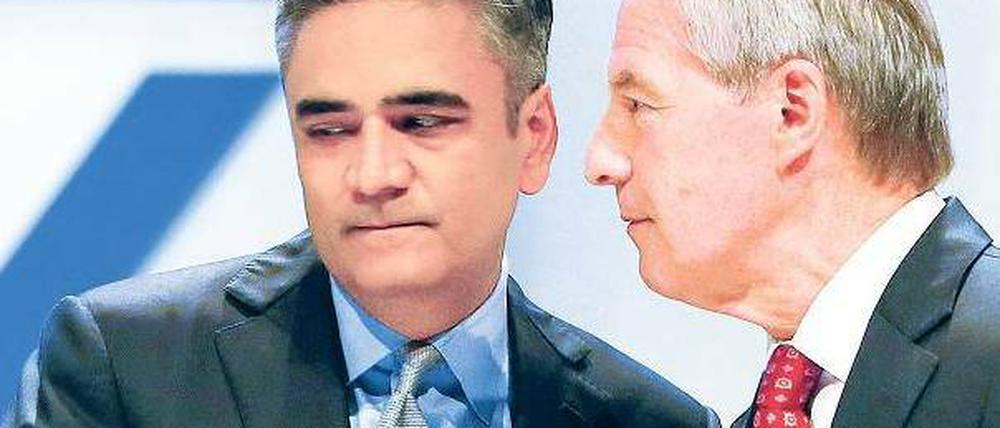 Blick zurück. Die Vergangenheit der Deutschen Bank beschäftigt die Co-Chefs Anshu Jain (l.) und Jürgen Fitschen.