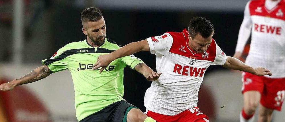 Der Kölner Slawomir Peszko (r.) und der Berliner Benjamin Köhler.