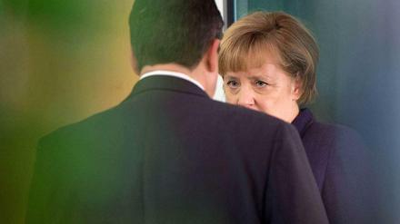 Bundeskanzlerin Angela Merkel (CDU) und SPD-Parteichef Sigmar Gabriel am Rande der Verhandlungen.