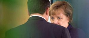 Bundeskanzlerin Angela Merkel (CDU) und SPD-Parteichef Sigmar Gabriel am Rande der Verhandlungen.