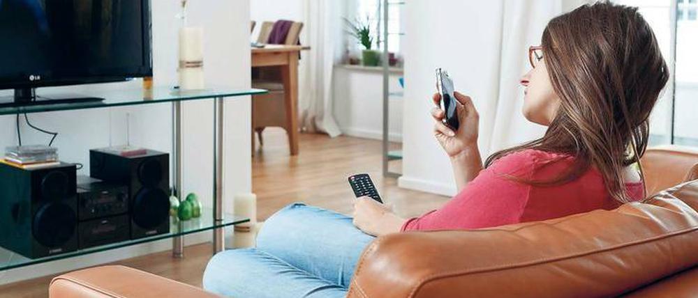 Jeder dritte TV-Zuschauer nutzt nebenher ein Smartphone oder Tablet. Foto: pa/dpa