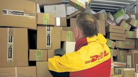 Gut zu tun. Mehr als acht Millionen Pakete pro Tag will die Post befördern. Foto: dpa