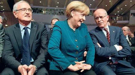 Führungswechsel. Detlef Wetzel (l.) folgt auf Berthold Huber, den die Kanzlerin am Montag als „geradlinig und zuverlässig“ lobte.