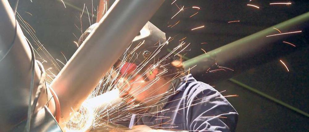 Der Funke springt über. Bislang waren deutsche Firmen bei Investitionen zögerlich – das könnte sich nun ändern. Foto: dpa