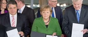 Amtliche Sache: Der Vertrag der Großkoalitionäre.