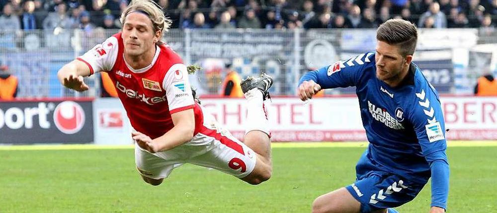 Eiserne Leichtigkeit: Unions Sören Brandy (l.).