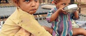 Sattwerden. Indien verkauft Reis und Getreide an Arme zu staatlich festgelegten Preisen. Das darf es nun auch weiter tun. Foto: picture alliance/dpa