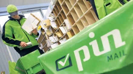 Die Beschäftigten fühlen sich von Pin unter Druck gesetzt und streiken. Das Unternehmen ist empört.