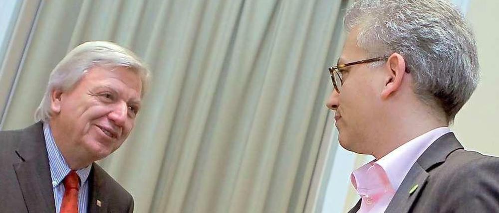 Die hessischen Parteivorsitzenden Volker Bouffier (CDU, links) und Tarek Al-Wazir (Bündnis 90/Die Grünen). 