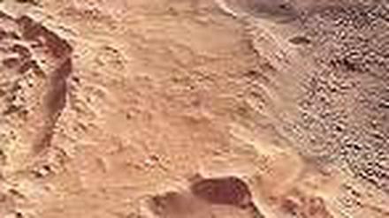Roter Planet. Eisenoxid-Staub gibt dem Mars seine rostrote Farbe. 