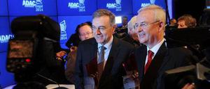 Was ist der Gegenwert? BMW-Chef Norbert Reithofer (l.) und der Vorstandsvorsitzende von Volkswagen, Martin Winterkorn, mit ihren "Gelben Engeln".