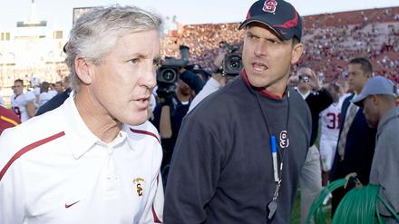 What’s your deal? Die Rivalität zwischen Pete Carroll (links) und Jim Harbaugh begann, als sie noch Trainer auf dem College waren. 