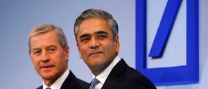 Das Führungsduo Fitschen(li.)/Jain steht im Augenblick vor einem Haufen Probleme. Nicht alle haben sie selbst produziert.