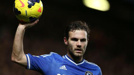 The weight of the world: Mata will be holding up United's dignity from now on. 