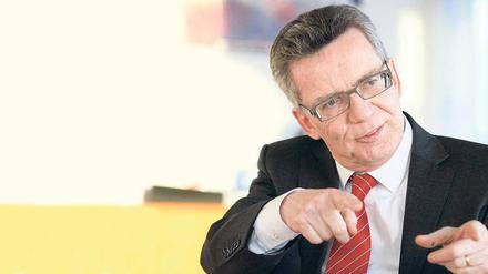 Innenminister Thomas de Maizière steht einer raschen deutschen Olympiabewerbung kritisch gegenüber.
