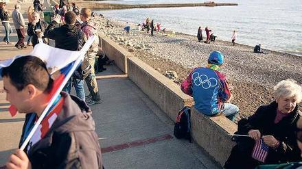 Spiele und Meer. Beschauliches Bummeln an der Strandpromenade.