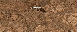 Vor einigen Wochen sorgte dieses Foto der Nasa für Wirbel: Auf ihm schien sich ein Donut zu befinden, der einige Wochen zuvor dort noch nicht lag. Nun konnte das Rätsel gelöst werden.