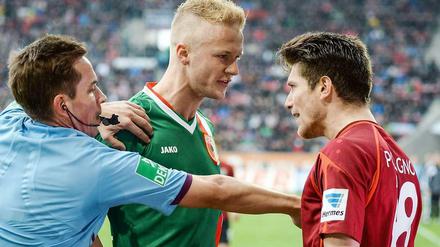 Keine bösen Wörter! Augsburgs Vogt und Hannovers Pocognoli im Disput.