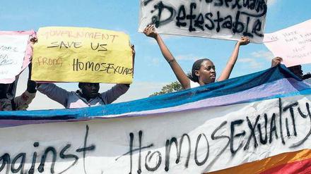 Vereint in der Ablehnung. Das Anti-Homosexuellen-Gesetz in Uganda ist sehr populär. Viele Ugander – wie diese Demonstranten in Kampala – halten Homosexualität für einen westlichen Sittenverfall, der nichts mit afrikanischen Werten zu tun hat. 