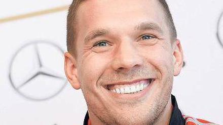 Immer optimistisch, immer positiv. Lukas Podolski, Einwanderer aus Polen. 