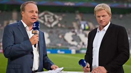Kennen sich bereits von der Champions-League: Oliver Welke (l.) und Oliver Kahn analysieren nun auch die Spiele der Fußball-WM in Brasilien. 