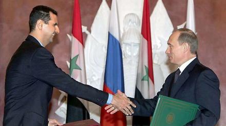 Alte Freund. Syrien Machthaber Assad und Wladimir Putin.