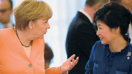 „Eiserne Ladys“. Die südkoreanische Präsidentin Park Geun-hye mit Angela Merkel am Rande des G20-Gipfels in Russland im September 2013.