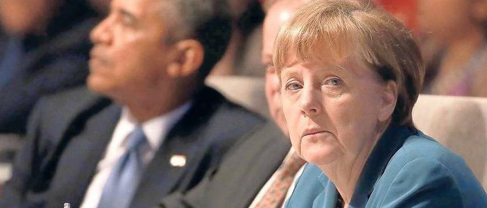 Unterschiedliche Perspektiven nehmen Amerikaner und Europäer beim Thema Freihandel ein. Beide Seiten, hier Barack Obama und Angela Merkel in Brüssel, betonen die Chancen eines Abkommens – Verbraucherschützer und Gewerkschaften eher die Risiken. Foto: dpa
