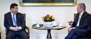 Chinas Staatspräsident Xi Jinping und Bundespräsident Joachim Gauck: Arbeitsbesuch im Zeichen engerer wirtschaftlicher Zusammenarbeit und internationaler Konflikte. 